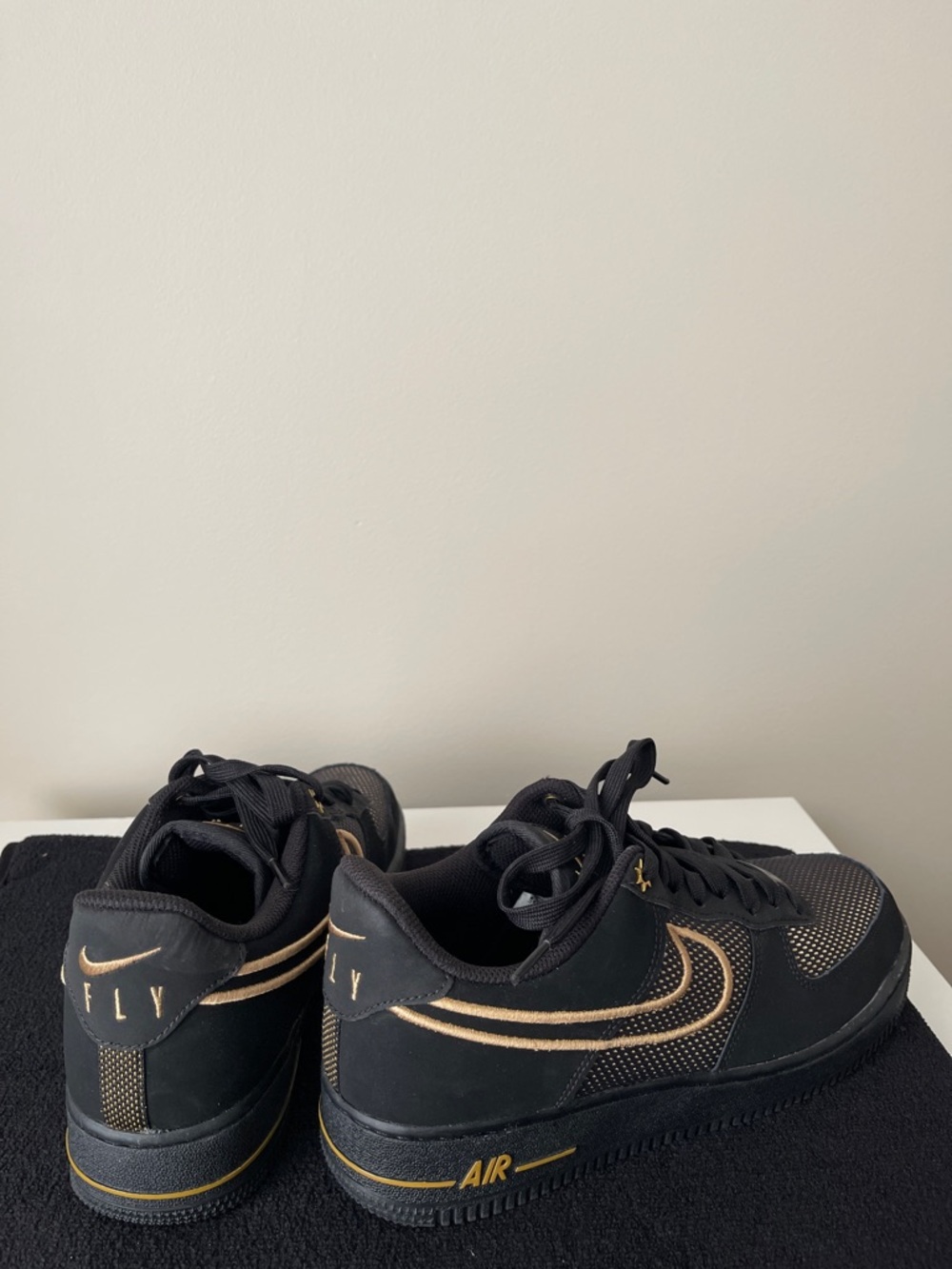 Nike Black and Gold Low-Top Sneakers